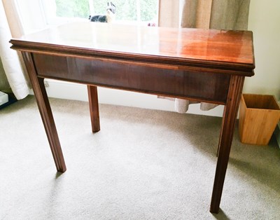 Lot 561 - A 19th century mahogany tea table, with...