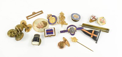 Lot 345 - A gold plated stick pin with the ensignia of...