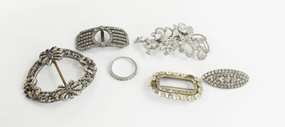 Lot 182 - A group of vintage paste buckles and brooches,...