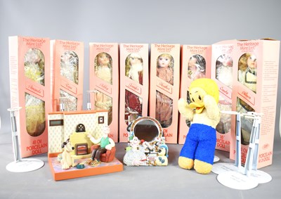 Lot 67 - A group of eight boxed porcelain dolls by The...