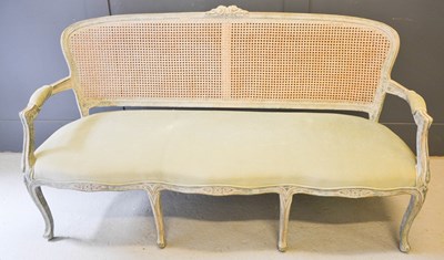 Lot 628 - A French 19th century style settee, the caned...