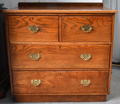 Lot 476 - An antique elm chest of drawers, two deep over...