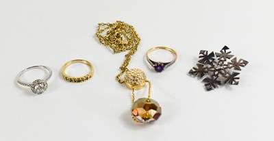 Lot 225 - A 9ct gold, sapphire and brilliant seven stone...