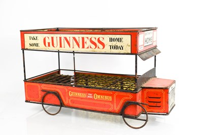 Lot 329 - A vintage Guiness tin-plate Omnibus bottle...