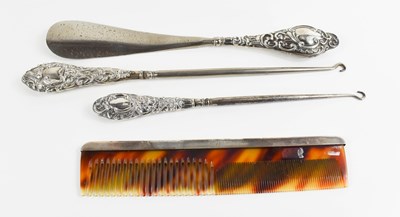 Lot 416 - A sterling silver and faux tortoiseshell comb,...