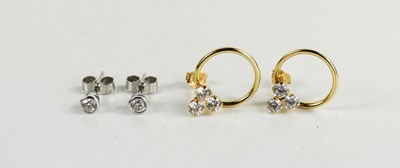 Lot 97 - A pair of 18ct white gold and diamond earrings,...