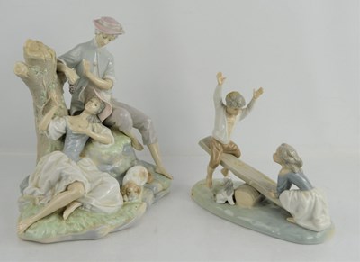 Lot 103 - A large lladro romantic pastoral group...