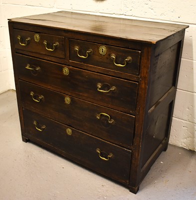 Lot 648 - An 18th century oak chest of drawers with...