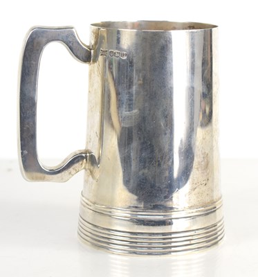 Lot 470 - A Walker and Hall silver pint tankard, of...