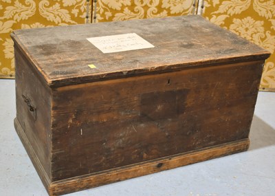 Lot 618 - An antique pine blanket chest with iron handles
