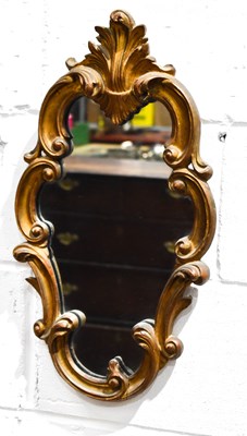 Lot 540 - A small 19th century scroll work wall mirror...