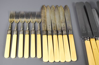 Lot 266 - A set of six silver fish knives and forks with...
