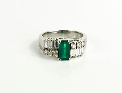 Lot 7 - A 14ct white gold, emerald and diamond Art...