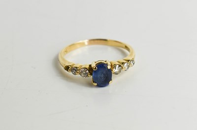 Lot 122 - A 14ct gold, diamond and tanzanite seven stone...