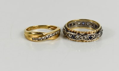 Lot 49 - A 9ct gold and diamond cross over ring, size N,...