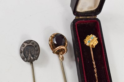 Lot 178 - A 15ct gold turquoise and seed pearl stock pin,...