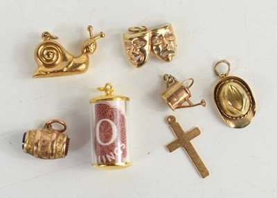 Lot 42a - A group of six 9ct gold charms, comprising a...
