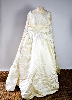 Lot 492 - A silk and lace vintage wedding dress, with...