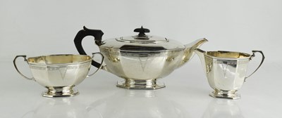 Lot 284 - A silver Art Deco tea set, comprising teapot,...
