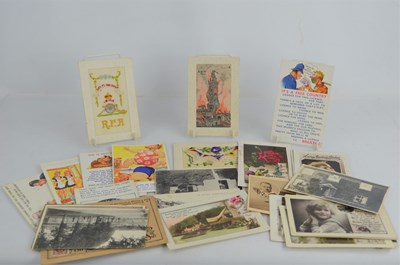 Lot 357 - A group of vintage postcards to include three...