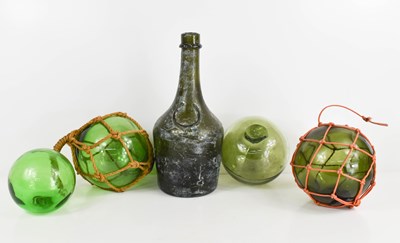 Lot 155 - Four antique green glass fishermans balls, and...