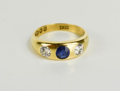 Lot 255 - An 18ct gold, diamond and deep cornflower blue...