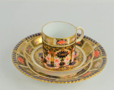 Lot 87 - A Royal Crown Derby Imari pattern coffee trio,...