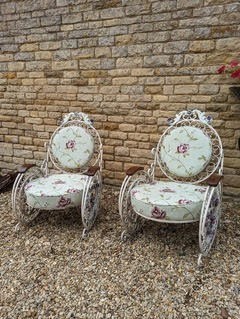 Lot 521 - A pair of fin-de-siecle cast iron garden...