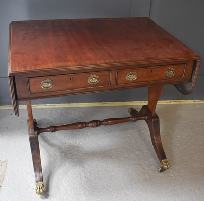 Lot 467 - A 19th century mahogany sofa table, with two...
