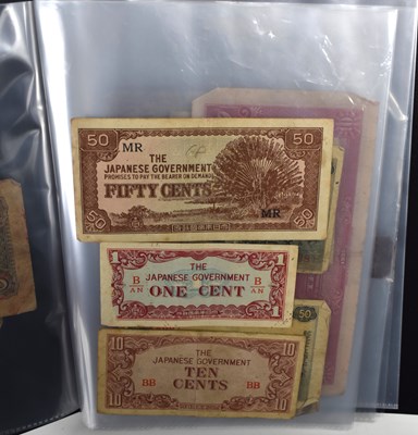 Lot 61 - A group of vintage banknotes to include a...
