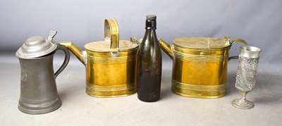 Lot 350 - Two brass watering cans, a pewter lidded...