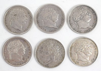 Lot 73 - Six George III and George IV silver shillings...