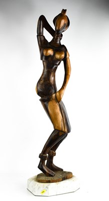 Lot 379 - A large hardwood African carved figurine of a...
