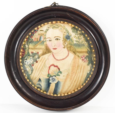 Lot 275 - An 18th century stumpwork roundel panel,...