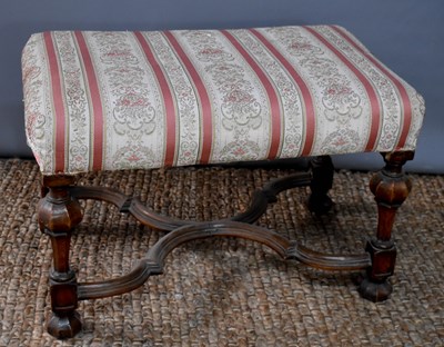 Lot 465 - A walnut 19th century stool, with shaped and...