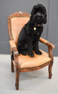 Lot 473 - A 19th century childs beech armchair, with...