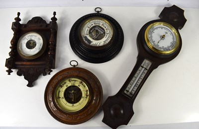 Lot 437 - A group of four 20th century oak cased...