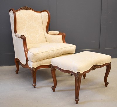 Lot 504 - A late 19th century wing back armchair, with...