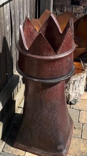Lot 520 - A reclaimed terracotta chimney pot, 89cms