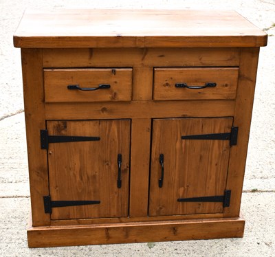 Lot 456 - A modern pine cabinet with two drawers and two...