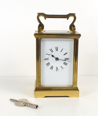 Lot 436 - A French brass cased carriage clock, white...