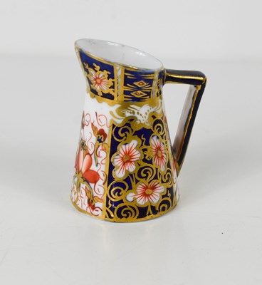 Lot 207 - A Royal Crown Derby miniature Imari pattern jug