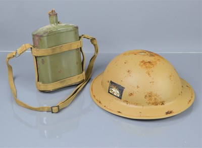 Lot 458 - A WWII era British desert Brodie helmet and...