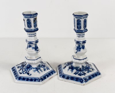 Lot 232 - A pair of Meissen blue and white candlesticks,...