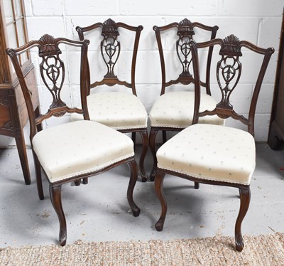 Lot 461 - A set of four mahogany dining chairs with...