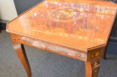 Lot 613 - An Italian inlaid games table