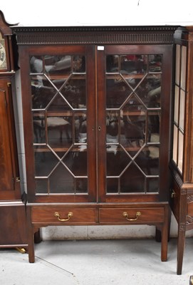 Lot 460A - A mahogany glazed cabinet, with two glass...
