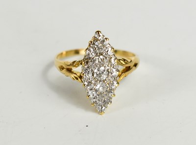 Lot 261 - An 18ct gold and diamond dress ring, the...