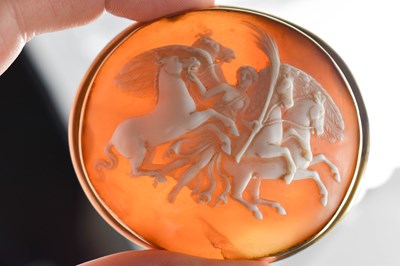Lot 39 - A 19th century cameo brooch, carved with a...