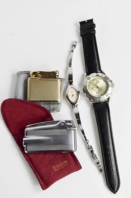 Lot 348 - A Ronson and a Calibri zippo lighter, together...